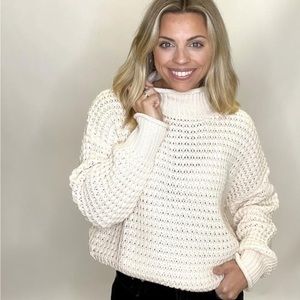 White turtleneck sweater